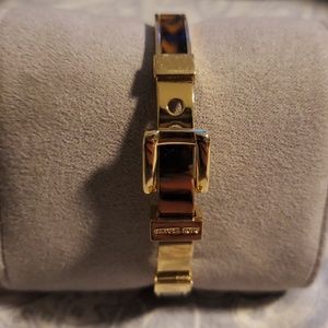 MK tortoise gold bangle